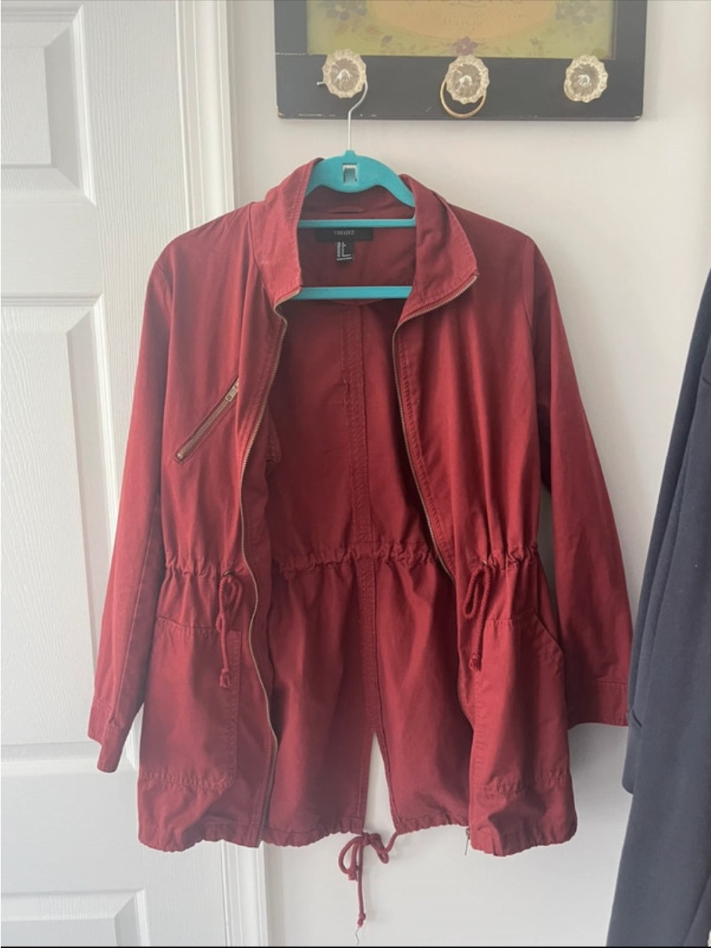 burgundy jacket with lots of pockets